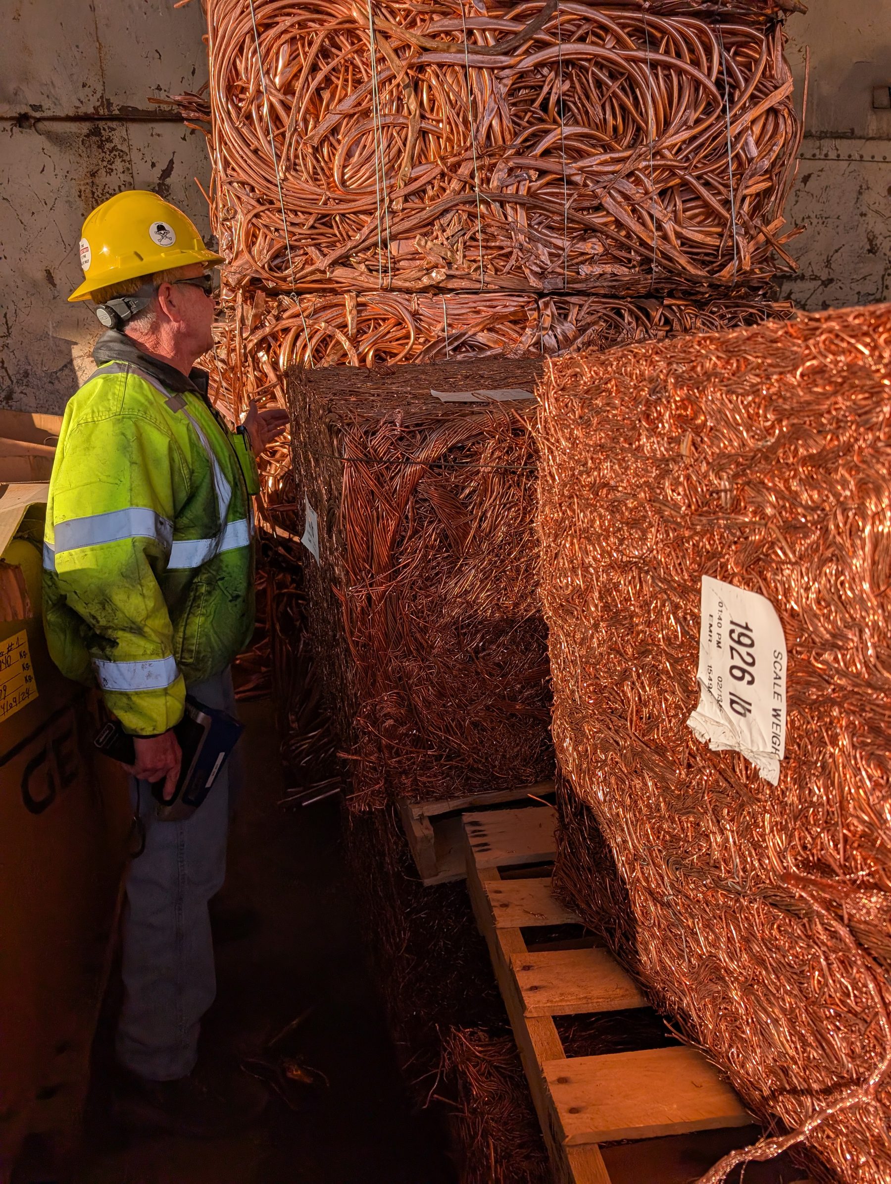 Copper bales staged for the furnace