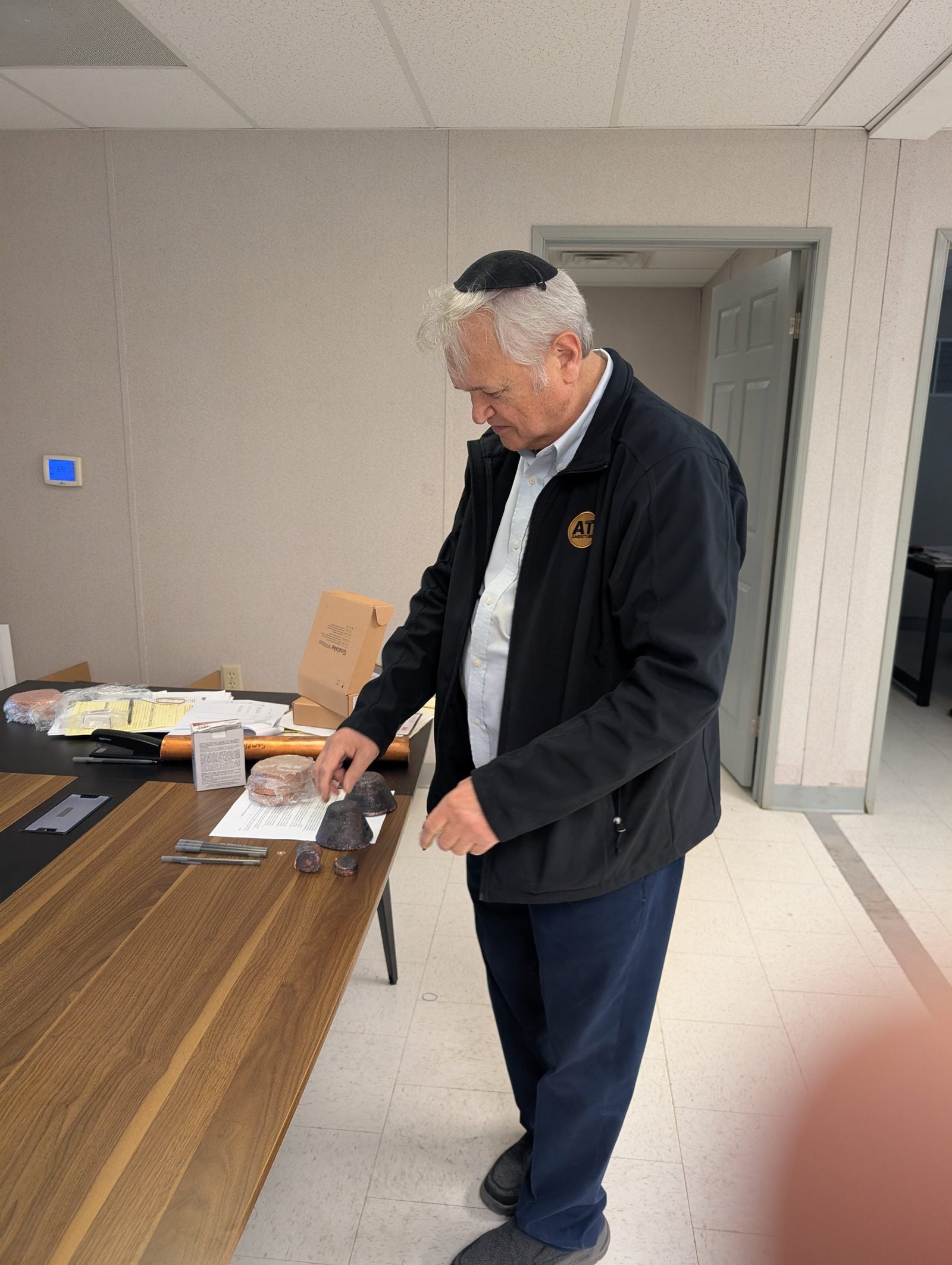 Reviewing cast copper samples at Ameritube